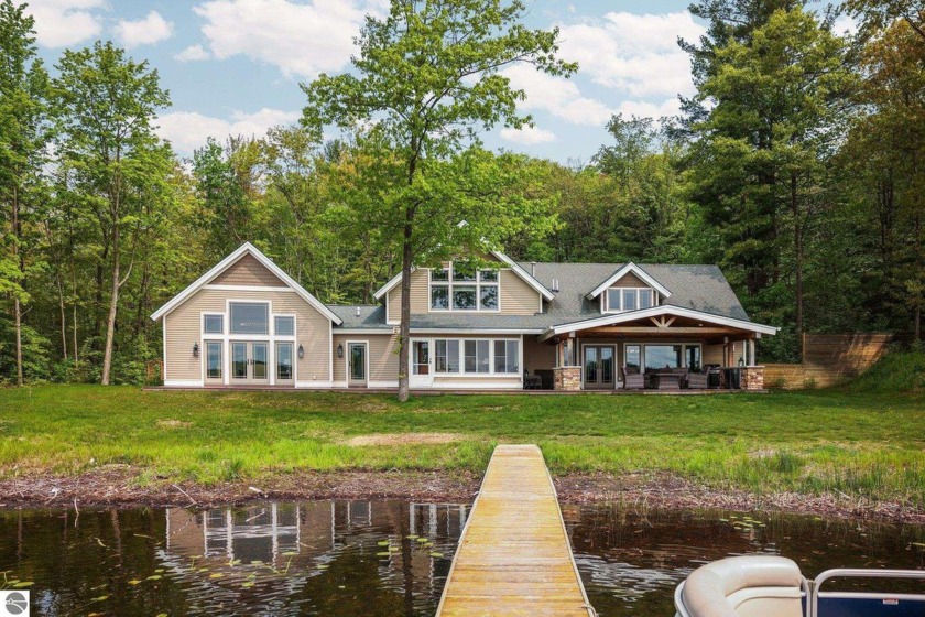 Discover this custom 6-bedroom, 5-bath home on the peaceful - Beach Home for sale in Empire, Michigan on Beachhouse.com
