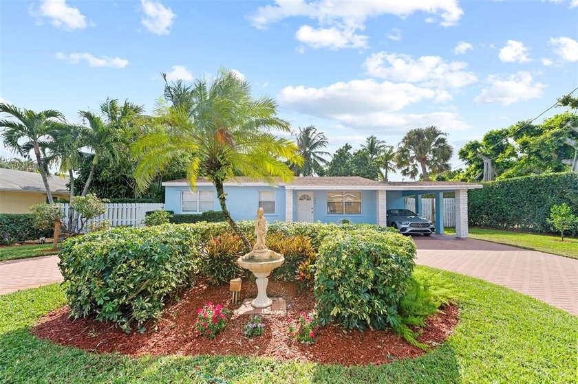Discover this beautifully maintained 4-bedroom, 2-bath home - Beach Home for sale in West Palm Beach, Florida on Beachhouse.com