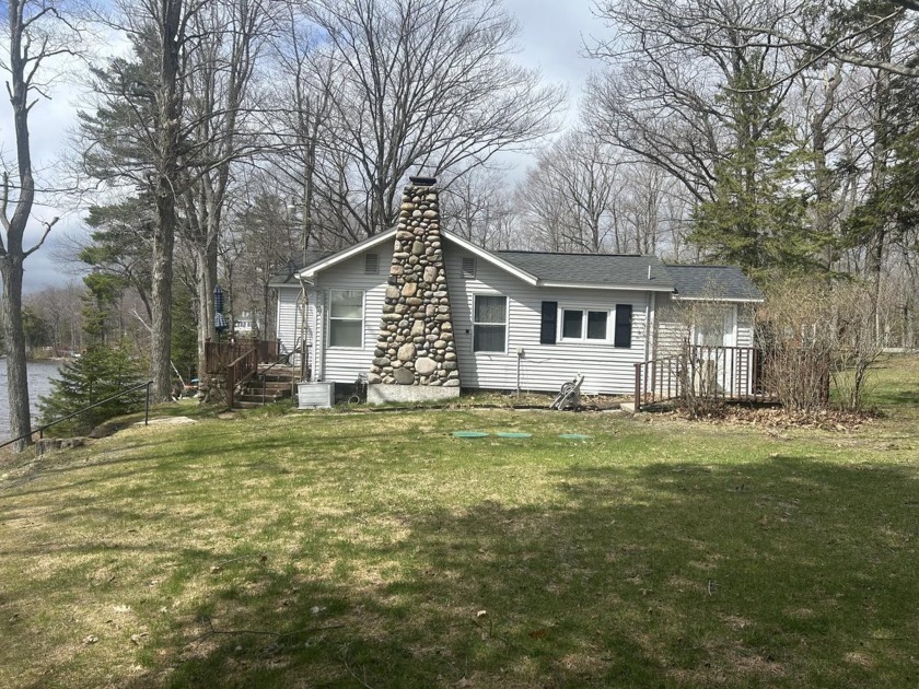 Lakefront living at it's best on Carp/Paradise Lake!
Welcome to - Beach Home for sale in Carp Lake, Michigan on Beachhouse.com