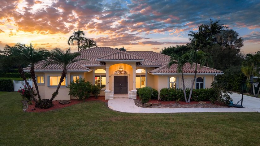Welcome home! Located in a gated Hammer Heritage Estates, this - Beach Home for sale in Davie, Florida on Beachhouse.com