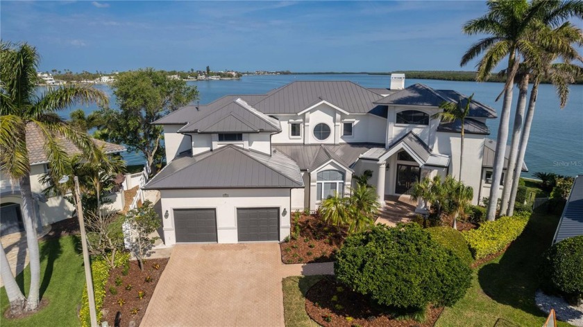 Welcome to Island Estates' newest listing that sits arguably on - Beach Home for sale in Clearwater, Florida on Beachhouse.com
