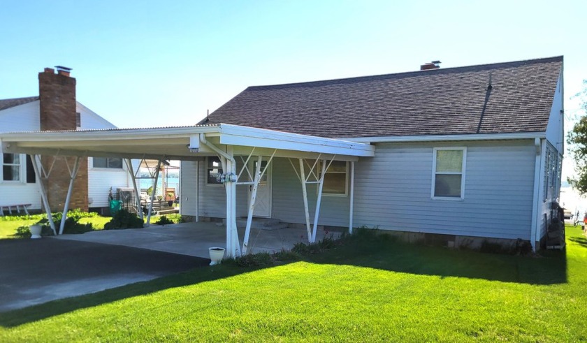 Discover your idyllic getaway at this charming bungalow with 50 - Beach Home for sale in Alpena, Michigan on Beachhouse.com