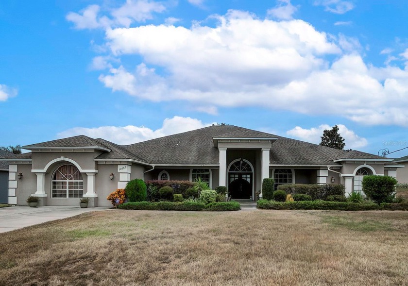 Situated on the prestigious grounds of Oak Hill Golf Course - Beach Home for sale in Spring Hill, Florida on Beachhouse.com