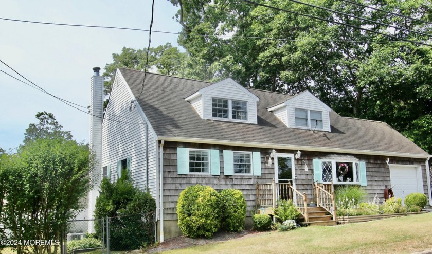 Shark River Hills Cape. 1875 sq ft. Updated kitchen with granite - Beach Home for sale in Neptune, New Jersey on Beachhouse.com