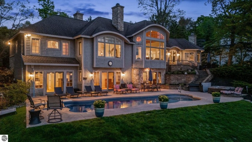 The name says it all-Beautiful Shores. This extraordinary - Beach Home for sale in Traverse City, Michigan on Beachhouse.com