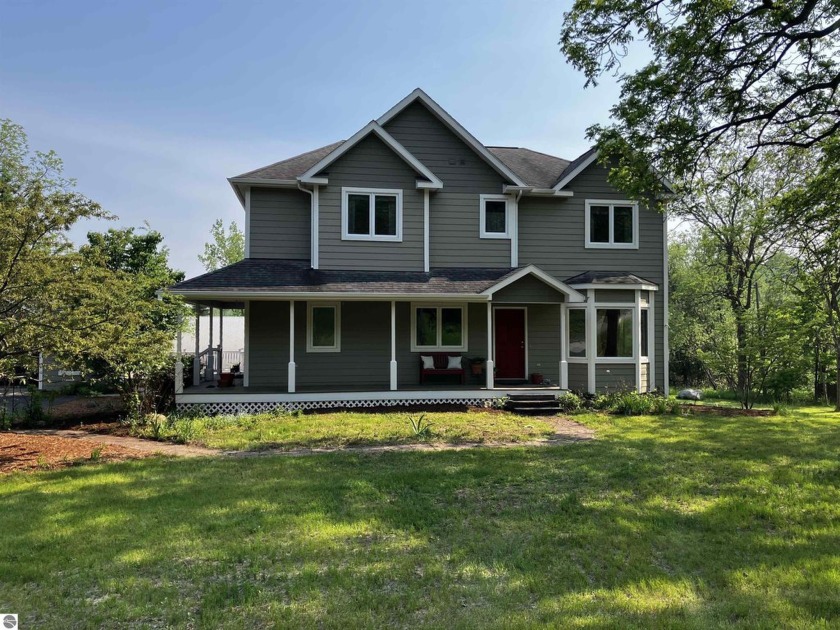 Looking for a home where you can stroll to the beach, downtown - Beach Home for sale in Traverse City, Michigan on Beachhouse.com