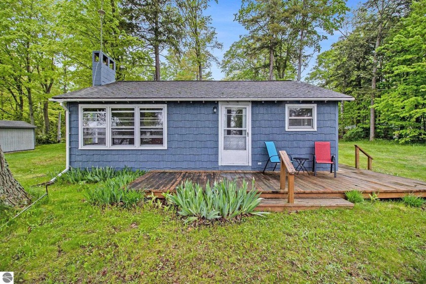 Nestled on the peaceful shores of a quiet Upper Herring Lake - Beach Home for sale in Frankfort, Michigan on Beachhouse.com