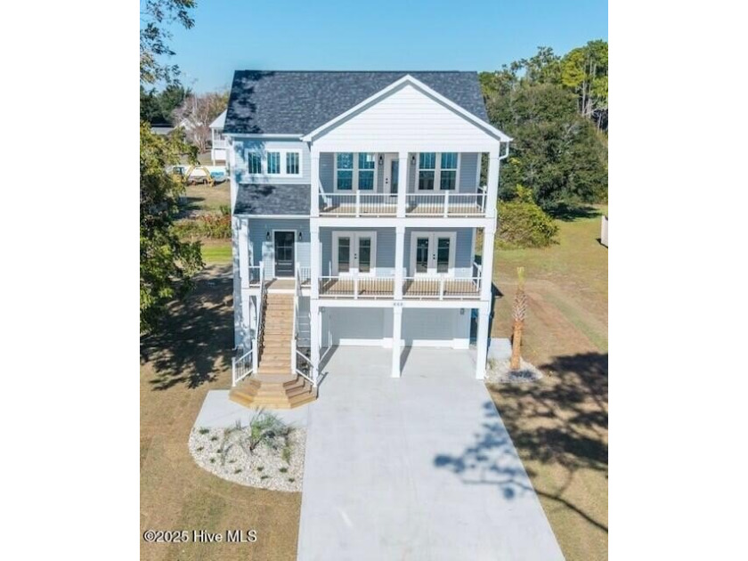 Experience elevated coastal living in this impeccably crafted - Beach Home for sale in Newport, North Carolina on Beachhouse.com