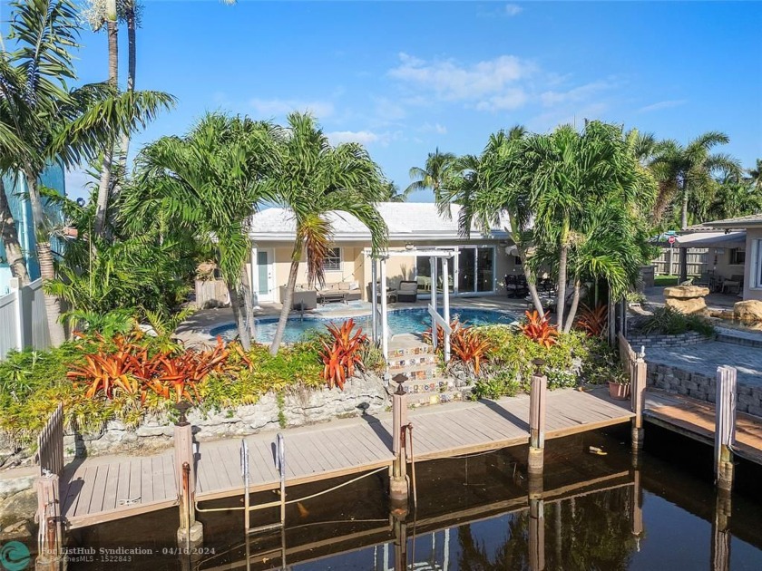 Stunning waterfront home in the heart of The Cove! Tastefully - Beach Home for sale in Deerfield Beach, Florida on Beachhouse.com