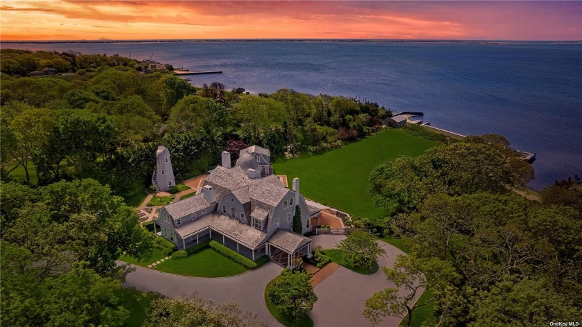 This majestic, one-of-a-kind estate is set on 4+ private - Beach Home for sale in Remsenburg, New York on Beachhouse.com
