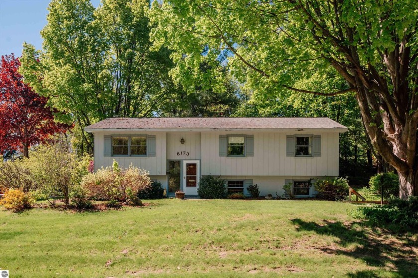 Tucked near the base of Old Mission Peninsula in the - Beach Home for sale in Traverse City, Michigan on Beachhouse.com