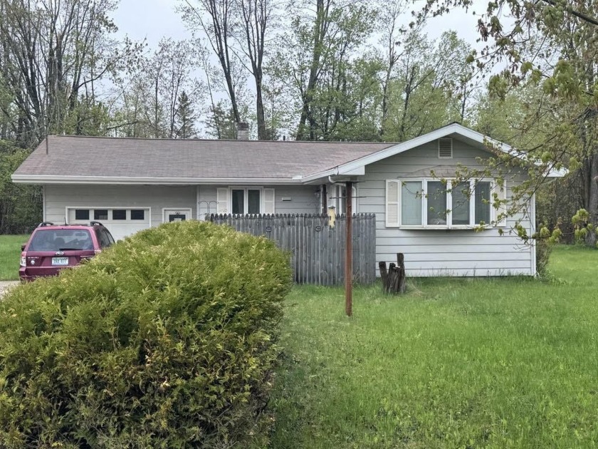 Discover the best of both worlds with this charming 2-bedroom - Beach Home for sale in Alpena, Michigan on Beachhouse.com