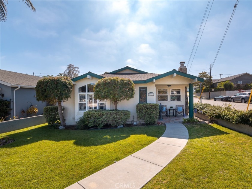 Nestled at 877 Center, this inviting 3 bed, 2 bath, corner lot - Beach Home for sale in El Segundo, California on Beachhouse.com