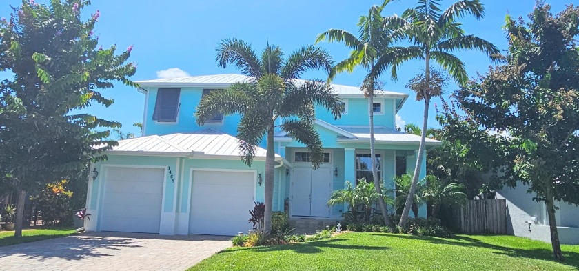 Don't miss out on this Ocean access, custom, pool home in the - Beach Home for sale in Palm City, Florida on Beachhouse.com