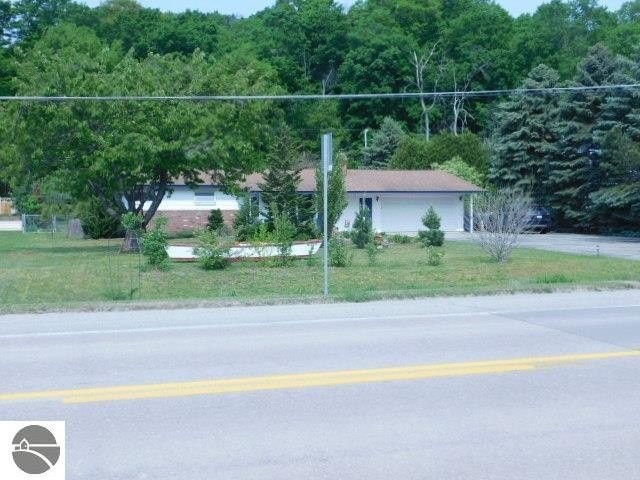 Enjoy visiting wineries, breweries, beaches and more from this - Beach Home for sale in Traverse City, Michigan on Beachhouse.com