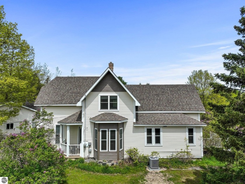 Discover this beautifully renovated 4 bed, 2.5 bath farmhouse - Beach Home for sale in Traverse City, Michigan on Beachhouse.com