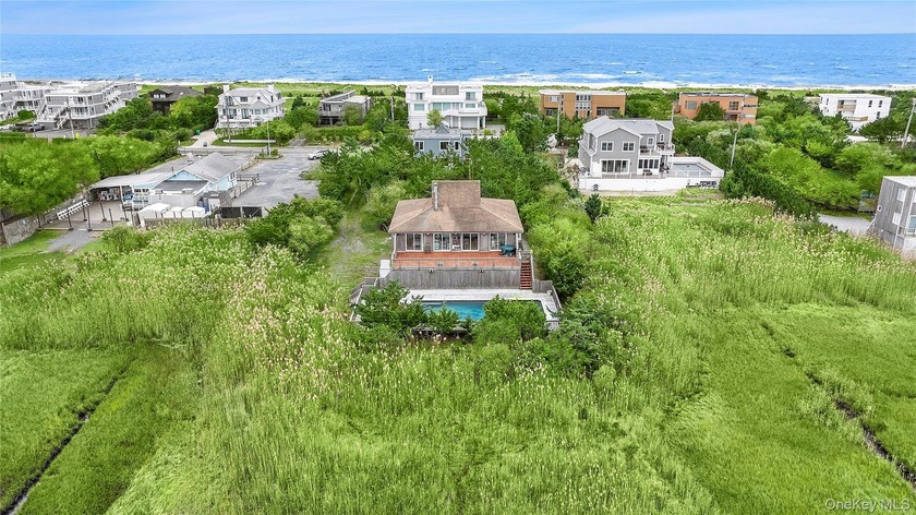 With unobstructed water views over +/-4.2 acres, this - Beach Home for sale in Westhampton, New York on Beachhouse.com
