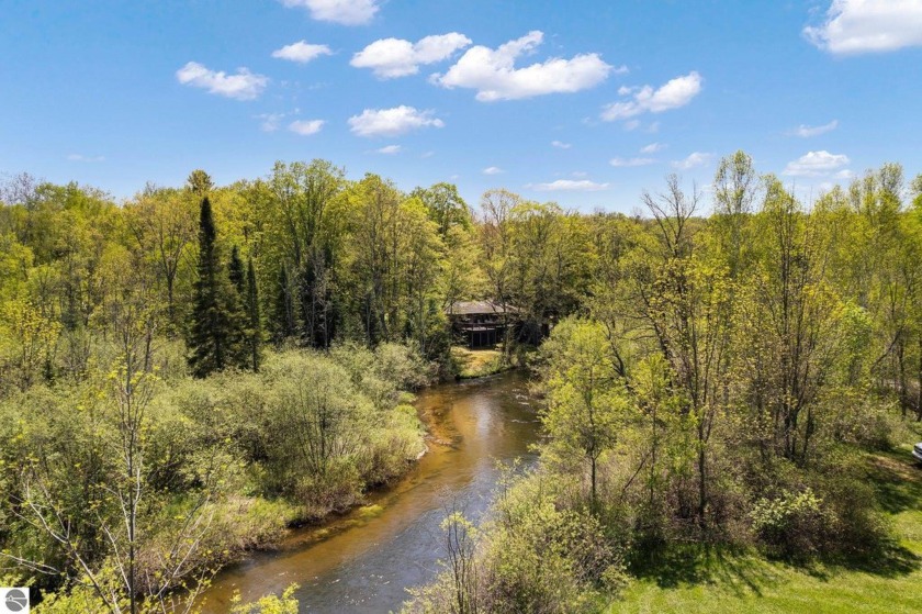 Discover a one-of-a-kind 11.5-acre sanctuary nestled along - Beach Home for sale in Traverse City, Michigan on Beachhouse.com