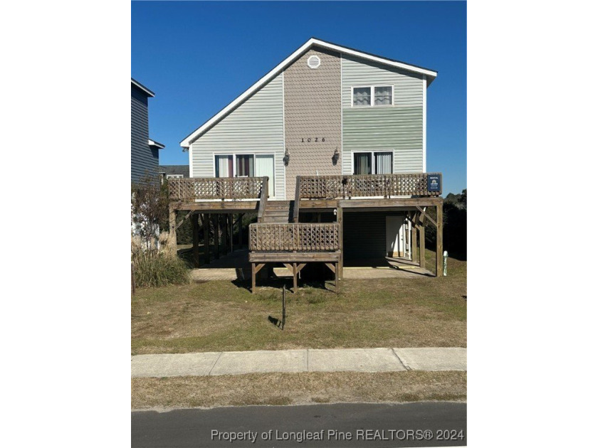 This home has beautiful water views from the front and rear with - Beach Home for sale in Holden Beach, North Carolina on Beachhouse.com