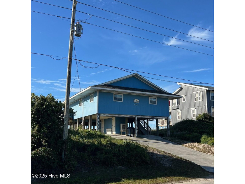 LOCATION LOCAITON....Light, airy, and coastal oceanfront single - Beach Home for sale in Emerald Isle, North Carolina on Beachhouse.com