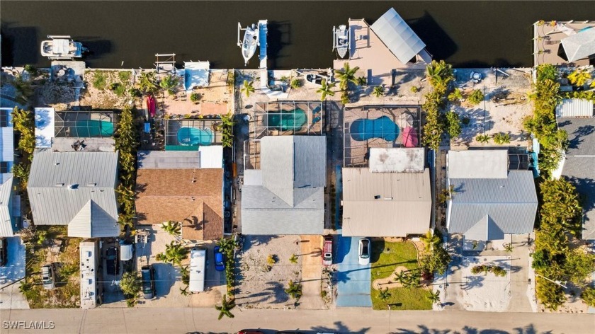 Discover island charm and waterfront luxury in this boater's - Beach Home for sale in Matlacha, Florida on Beachhouse.com