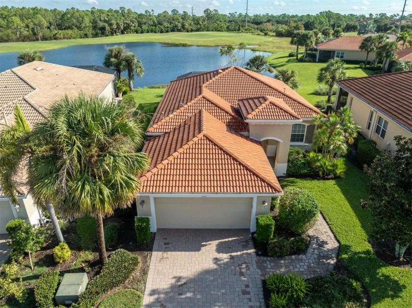 This stunning WCI-built  home offers a picturesque view from - Beach Home for sale in Nokomis, Florida on Beachhouse.com