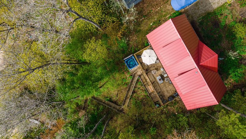 **MUST SEE VIDEO - ** Historic Log Home with Lake Huron Frontage - Beach Home for sale in Harrisville, Michigan on Beachhouse.com