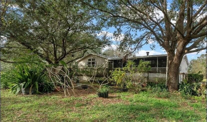 Welcome to your private retreat in Wimauma, FL. Nestled on 5.82 - Beach Home for sale in Wimauma, Florida on Beachhouse.com