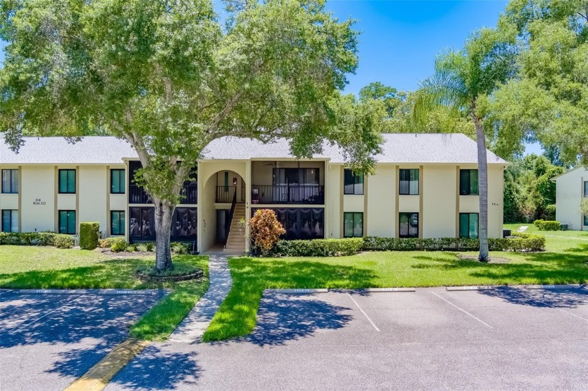 Welcome to a three-bedroom, two-full-bathroom second floor - Beach Condo for sale in Tarpon Springs, Florida on Beachhouse.com