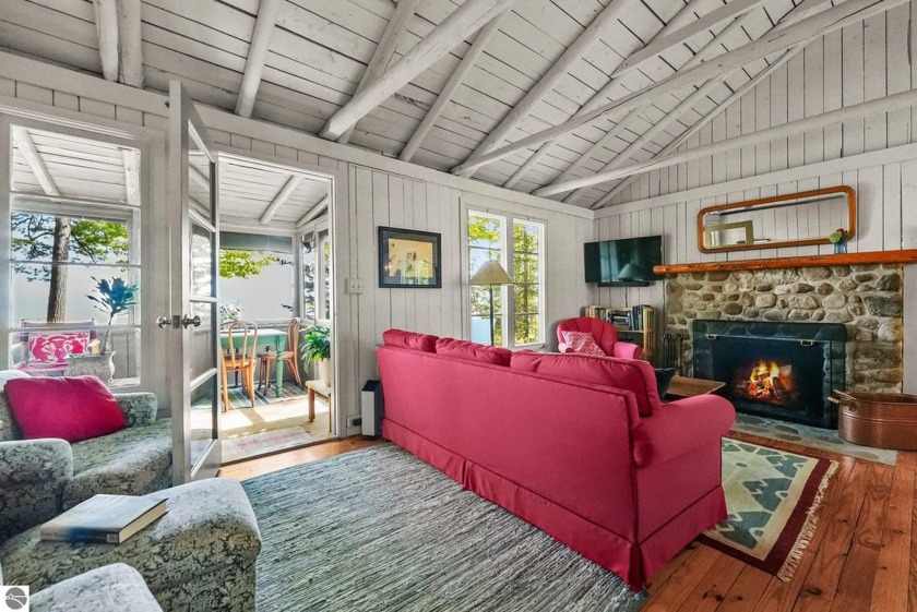 Discover a timeless escape in this classic 1930s Northport - Beach Home for sale in Northport, Michigan on Beachhouse.com