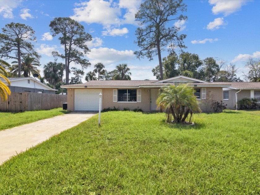 Welcome to your charming oasis in the highly sought-after Bay - Beach Home for sale in Port Richey, Florida on Beachhouse.com