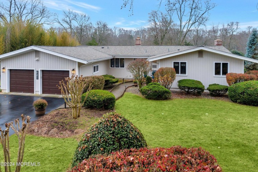 This charming 5-bedroom, 2-bath, ranch-style home is located on - Beach Home for sale in Brielle, New Jersey on Beachhouse.com