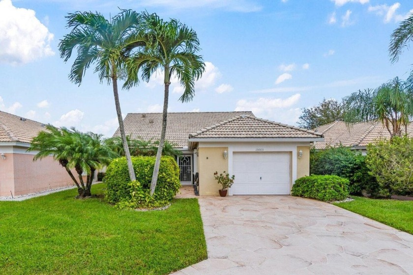 This charming 2-bedroom, 2-bathroom, + a den lakefront home is - Beach Home for sale in Boynton Beach, Florida on Beachhouse.com