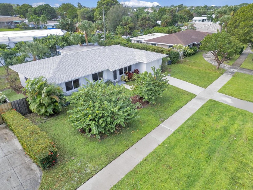 Welcome to this beautifully updated 3-bed, 2-bath gem with a - Beach Home for sale in North Palm Beach, Florida on Beachhouse.com