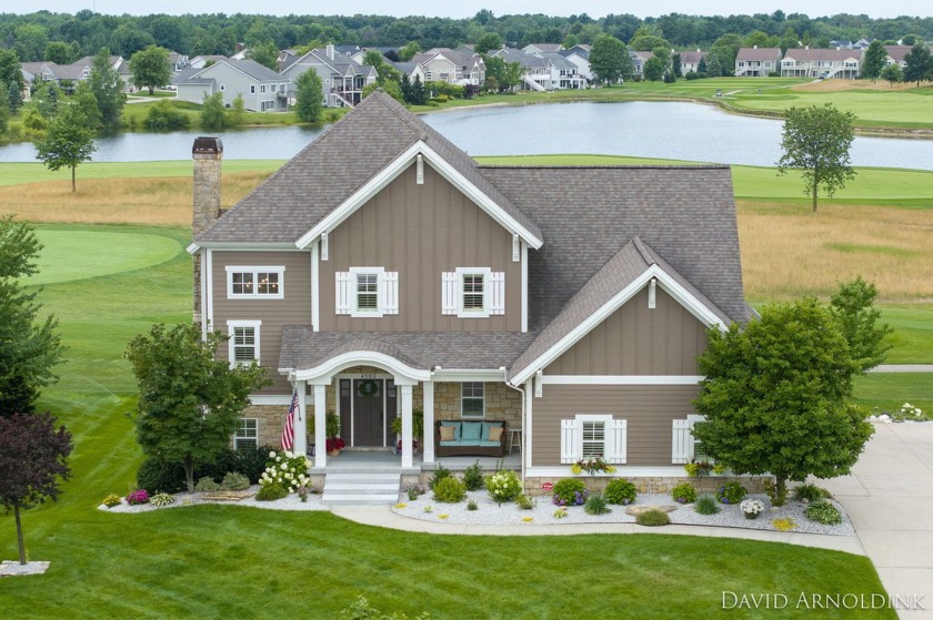 Stunning Macatawa Legends home on sought after Grand Point. This - Beach Home for sale in Holland, Michigan on Beachhouse.com