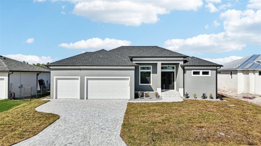 This exquisite brand new built home, nestled in the idyllic - Beach Home for sale in Port Charlotte, Florida on Beachhouse.com