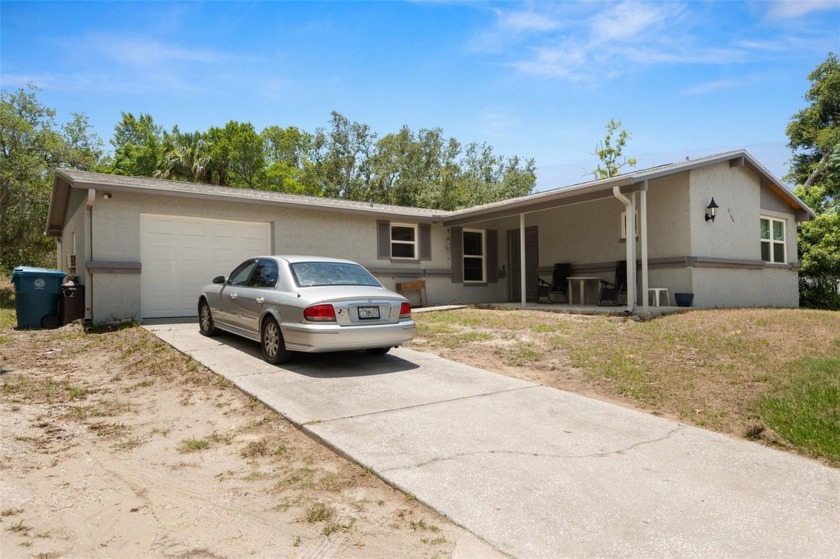 Welcome home to this 3/2 with a 4th den/Bed off of the garage in - Beach Home for sale in Spring Hill, Florida on Beachhouse.com