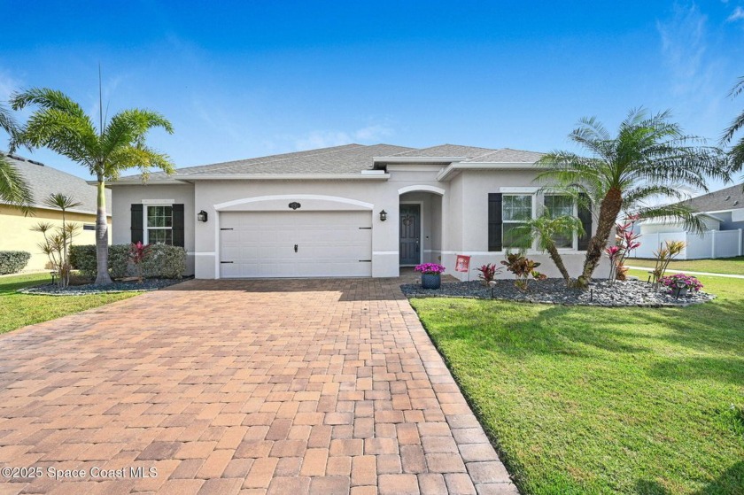 Featuring 4 bedrooms and 3 baths, this spacious home is move-in - Beach Home for sale in Merritt Island, Florida on Beachhouse.com