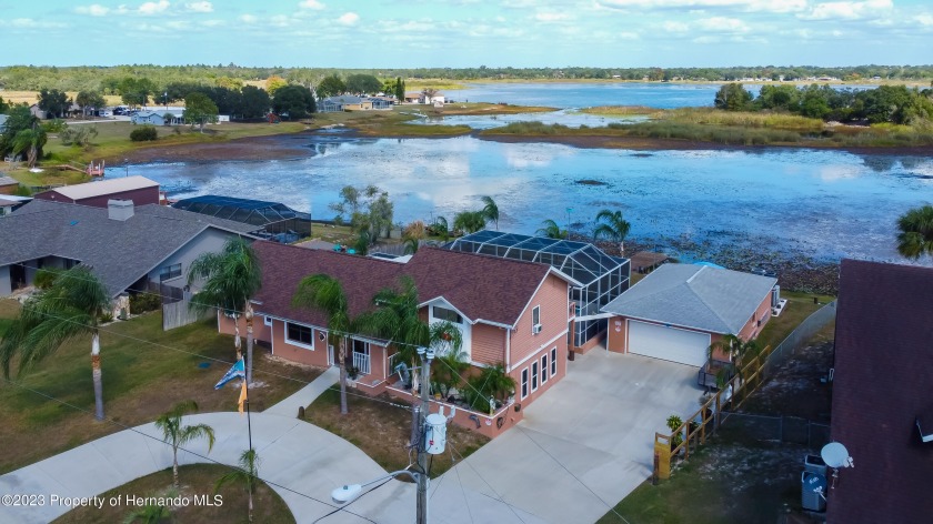 Come see the fantastic POOL HOME on a BEAUTIFUL LARGE LOT, WITH - Beach Home for sale in Spring Hill, Florida on Beachhouse.com