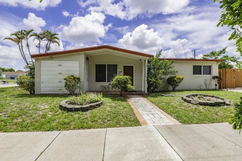 Discover this centrally located, fully renovated corner home - Beach Home for sale in Hollywood, Florida on Beachhouse.com