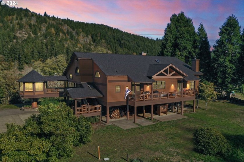 Welcome to your dream retreat on the Siuslaw River! This - Beach Home for sale in Mapleton, Oregon on Beachhouse.com