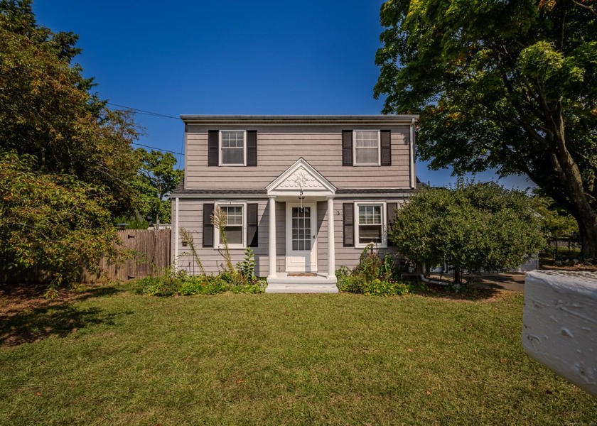 Welcome to this 4-bedroom, 2-bathroom expanded cape located at 5 - Beach Home for sale in East Haven, Connecticut on Beachhouse.com