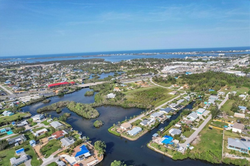 Enjoy sweeping water views on two sides of this lovely canal - Beach Home for sale in Englewood, Florida on Beachhouse.com