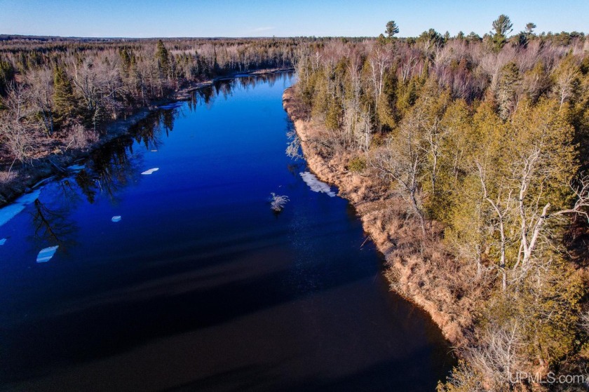 Beautiful 11 acre Parcel on the Whitefish River. High land - Beach Acreage for sale in Rapid River, Michigan on Beachhouse.com