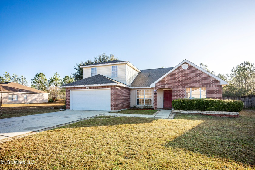 Nestled in a quiet, established neighborhood, this - Beach Home for sale in Ocean Springs, Mississippi on Beachhouse.com