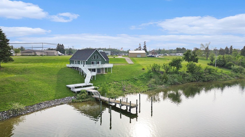 CHEBOYGAN RIVER - First Time Offered! Enjoy stunning river views - Beach Home for sale in Cheboygan, Michigan on Beachhouse.com