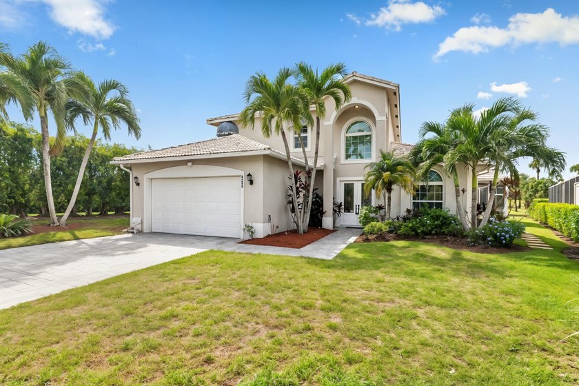 Bermuda-style home tucked within the peaceful Spray Cottages of - Beach Home for sale in West Palm Beach, Florida on Beachhouse.com