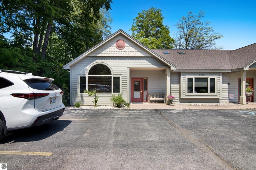 Welcome to Logan Cove!  This unit is an end unit facing the - Beach Commercial for sale in Traverse City, Michigan on Beachhouse.com