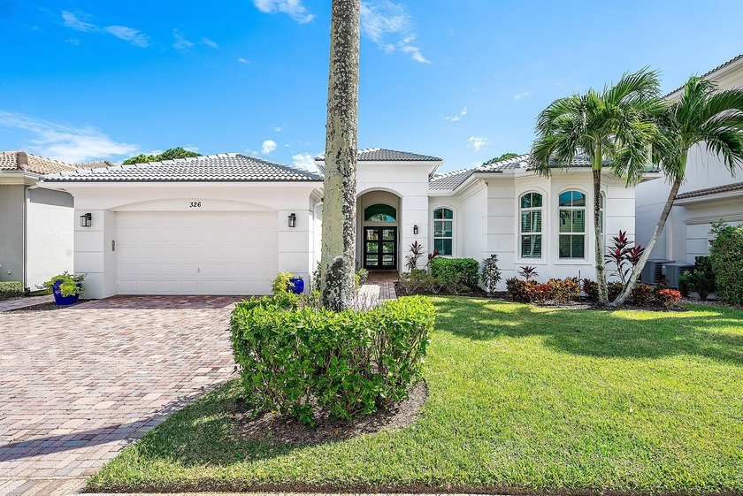 Discover luxury living at 326 Charroux Drive in prestigious - Beach Home for sale in Palm Beach Gardens, Florida on Beachhouse.com