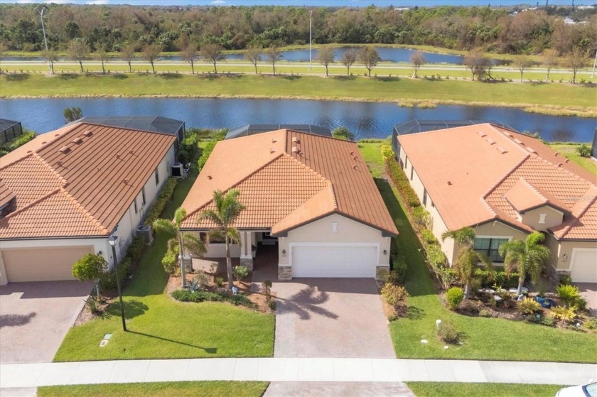 Must see NOW.  Pool home on Sarasota National's lake side. NO - Beach Home for sale in Venice, Florida on Beachhouse.com